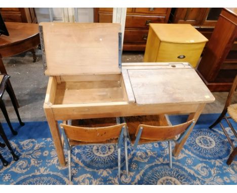 A vintage double child's desk with two seats and measuring 70 cm tall, 102 cm wide and 40 cm deep 