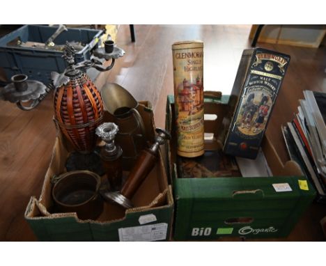 Two boxes of wooden and metal candlesticks, copper jug and vintage tins 