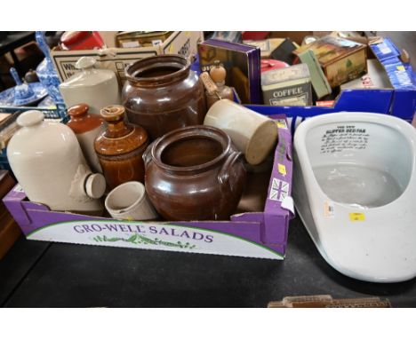 A vintage slipper bed pan and a box of ceramic hot water bottles and stoneware 