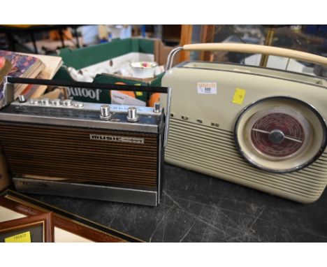 A vintage Bush radio together with a Grundig music boy radio 