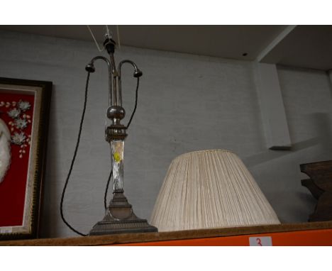A Neo-Classical style table lamp base with EPNS hallmarks to the base and cream shade 