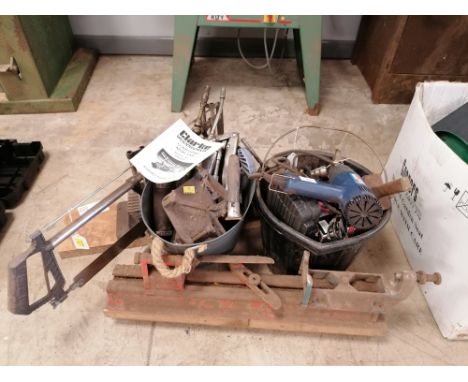 A Clarke wood work compound mitre saw together with two tubs of tools and attachments 