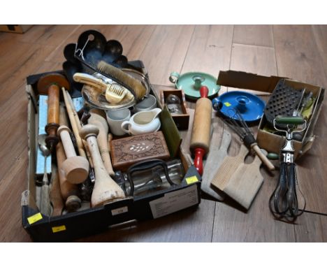 A box of vintage kitchen utensils, chamber sticks and other items 