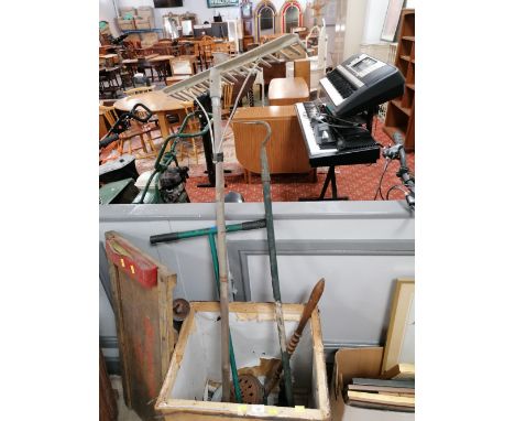 A small quantity of garden tools and a warming pan (tea chest not included)