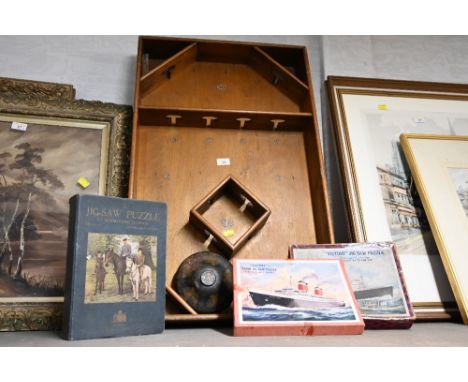 A vintage wooden table top game together with puzzles 