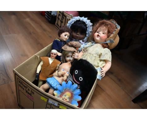A box of vintage dolls 