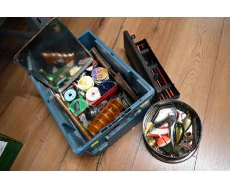 A box of tools and other items to include a fishing reel