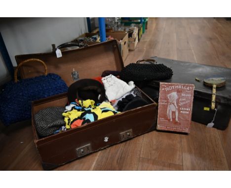 Two leather suitcases, one containing handbags and other vintage items  