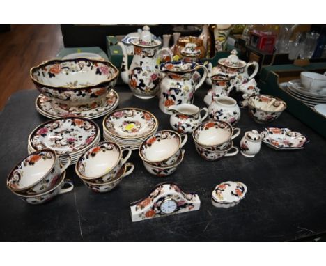 A quantity of Masons Mandalay patterned tableware to include coffee pot and tea pot plus tea cups and saucers 