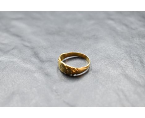 A Victorian yellow metal band ring having diamond chip and moulded decoration, no marks, size M &amp; approx 3.2g