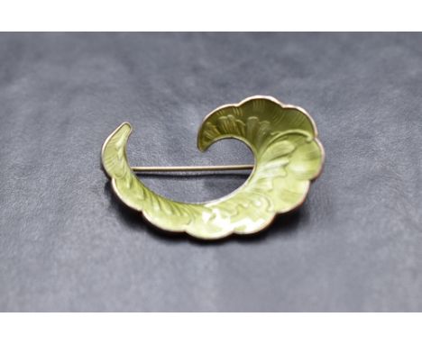 A Norwegian silver and green enamel brooch