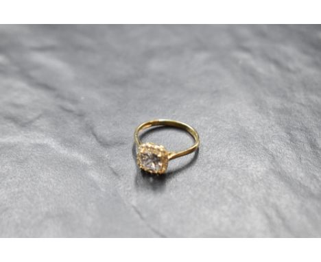 A  cubic zirconia halo ring on a 9ct gold loop, size M &amp; approx 2.1g