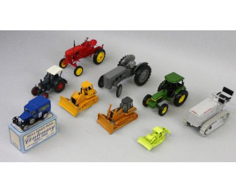 A selection of eight various tractor and construction vehicles, including Caterpillar 2-ton tractor, John Deere tractor and a