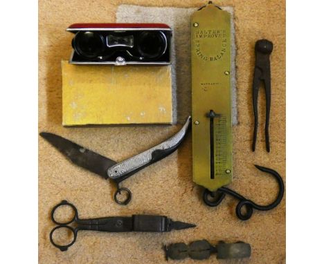 A box of collectables, opera glasses, Sovereign scales, Salter spring balance, bullet mould, candle snuffer and middle easter