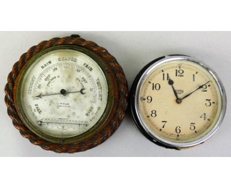 A Smith 8-day brass cased cabin clock, 18cm diameter, together with a brass cased cabin barometer, 18cm diameter, in an oak r