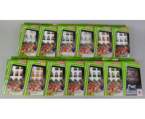 Thirteen complete Subbuteo table soccer '00' scale player teams from the 1990's, to include; Greece, Sheffield United, Blackp