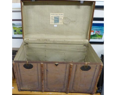 A lined travelling trunk bearing Italian retailers Florence label together with another leather bound suitcase and a small co