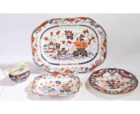 A Bloor Derby imari pattern plate, a first quarter of the 19th century Derby porcelain sauceboat, the white and blue ground w