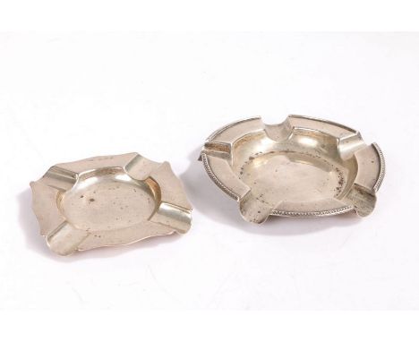 A George V silver ashtray, Birmingham 1927, maker walker &amp; Hall, with beaded rim and five recesses, a George VI silver as