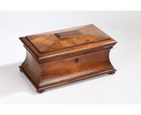 A Victorian rosewood sarcophagus tea caddy, the hinged lid enclosing a glass mixing bowl and twin tea compartments, raised on