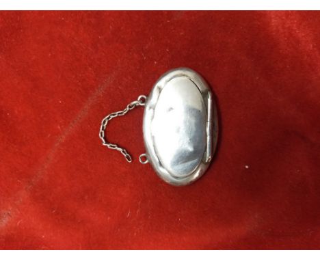 A small Silver Snuff Box or lock of hair container Pendant, Hallmarked 'H.W. Ld, Birmingham 1911. Some wear and minor dents