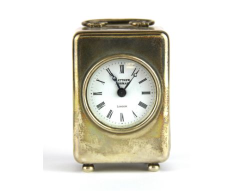 A hallmarked silver cased Matthew Norman carriage clock, size 4.5 x 6.5 x 4cm.
