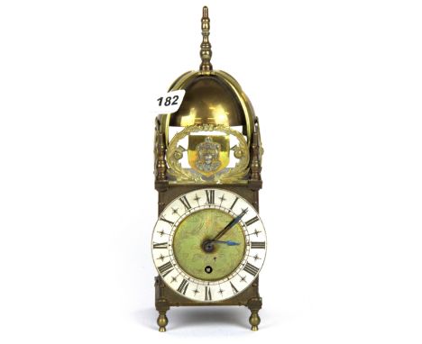 A brass lantern clock, H. 30cm.