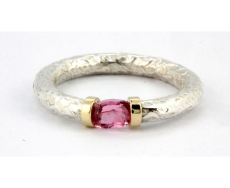 A white metal (tested silver and gold) tourmaline set ring, (N).