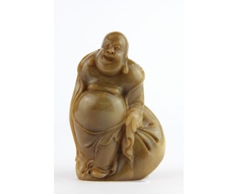 A mid 20th Century Chinese carved soapstone seal of the happy Buddha, H. 9cm.