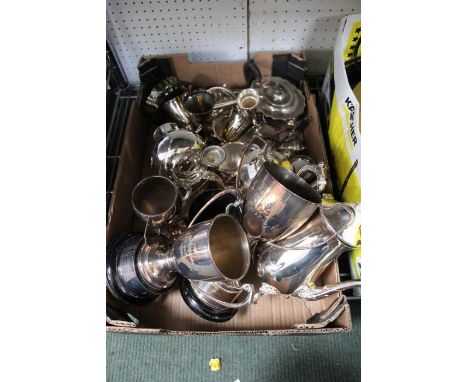 A box containing a selection of domestic plated wares to include trophy cups