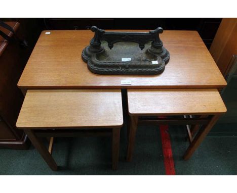 a nest of three vintage teak tables