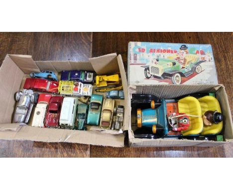 A Gaiety toy clockwork three wheel car, a battery operated car in original box, and various die-cast vehicles&nbsp;