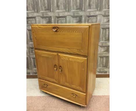 ERCOL LIGHT OAK SIDED CABINET, with hinged door over two cupboard doors and a drawer, on castors, 82cm wide, 110cm high, alon