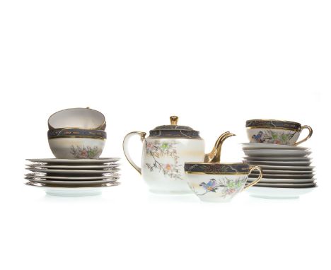 JAPANESE EGGSHELL PORCELAIN TEA SERVICE AND A COFFEE SERVICE, decorated with flowers and winter landscape scenery