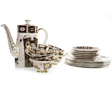 ROYAL CROWN DERBY IMARI PATTERN TEA SERVICE, comprising seven cups, seven saucers, six side plates and a coffee pot, 23cm hig