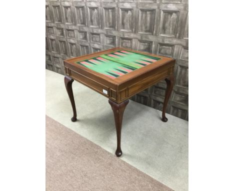 20TH CENTURY MAHOGANY GAMES TABLE, with chess, backgammon and roulette boards, above a roulette wheel, 86cm wide