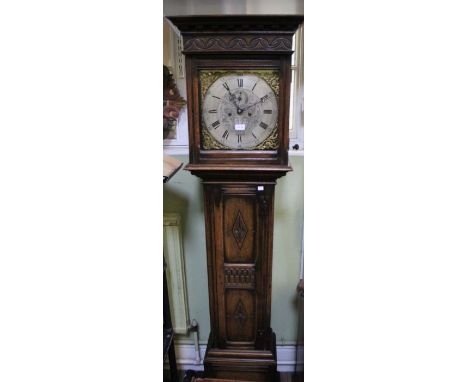 Oak longcase clock bearing the name E H Lawley &amp; Sons, Birmingham together with pendulum &amp; two weights