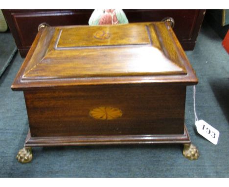 Inlaid tea caddy on brass feet