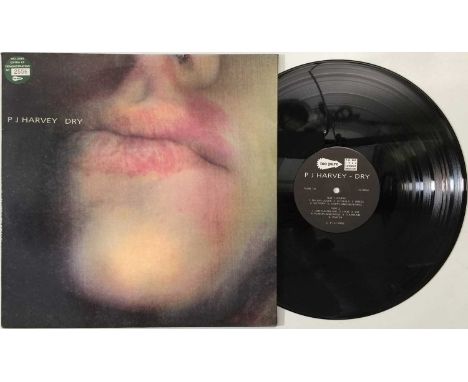 P J HARVEY - DRY LP + BONUS DEMONSTRATION LP (UK LIMITED NO: 2556 - PURE D10). A stunning copy of PJ Harvey's 1992 debut albu