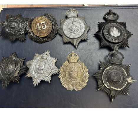 Collection of mainly helmet badges (8)