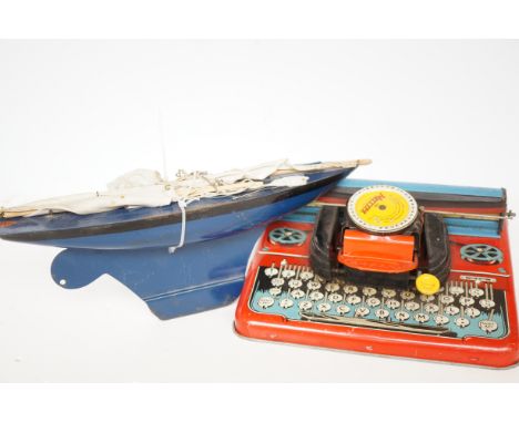 Vintage Mettype junior type writer together a Pond yacht