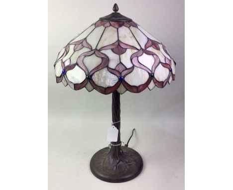 TIFFANY STYLE TABLE LAMP, CONTEMPORARY the leaded and stained glass shade set with blue cabochons, the turned, over a bronzed
