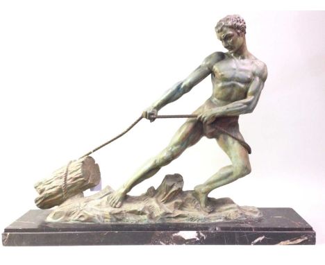 ART DECO STYLE BRONZED RESIN FIGURE, CONTEMPORARY modelled as a man pulling a log and on a oblong veined marble base72cm wide