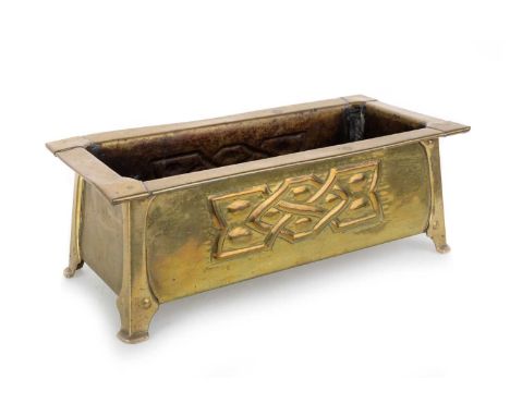 GLASGOW SCHOOL, ARTS & CRAFTS BRASS PLANTER, CIRCA 1900 of tapering oblong form, embossed with Celtic knotwork, on four brack