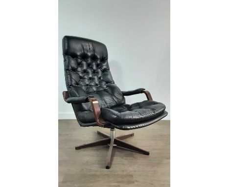 SCANDINAVIAN BLACK LEATHER AND PLYWOOD SWIVEL EASY CHAIR, 1960-69 button back upholstered, on chrome column support to base