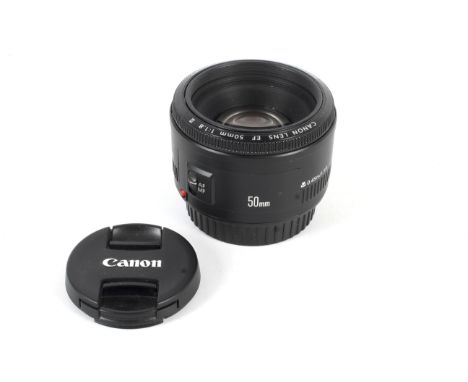 A Canon EF 50mm 1:1.8 II lens. With front and rear caps. Condition Report: Optics: Very good, no obvious scratches, haze, fog