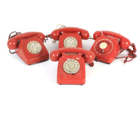 Four assorted red coloured rotary dial vintage telephones. Including BT 746F, a GPO 706L, GPO 746, and a GPO 706F