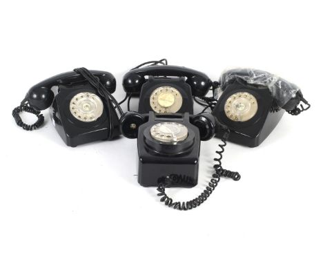Four assorted black plastic rotary dial telephones. Including a GPO 746L, two GEC 746 and a GPO 711L