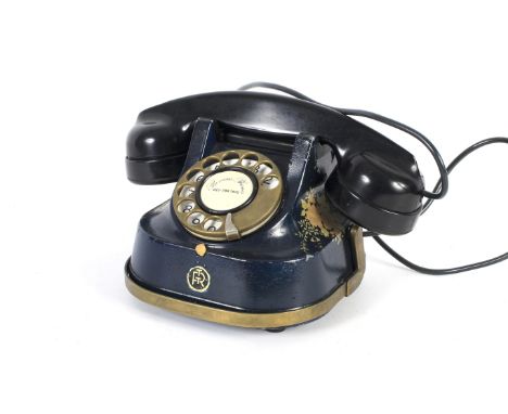 A RTT 56B retro rotary dial telephone. Painted decoration to metal case, with Bakelite Ericsson handset rewired for modern so