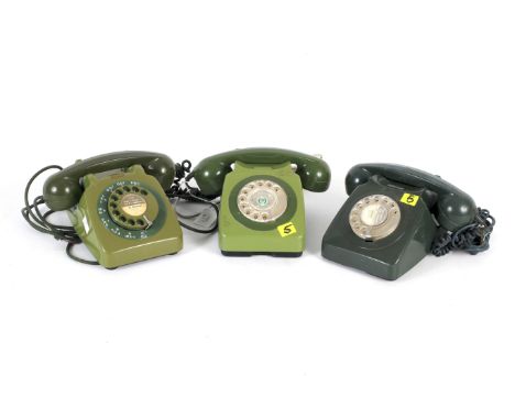 Three vintage green coloured rotary dial telephones. Including a GPO 706, a BT 746F and a GPO 746F